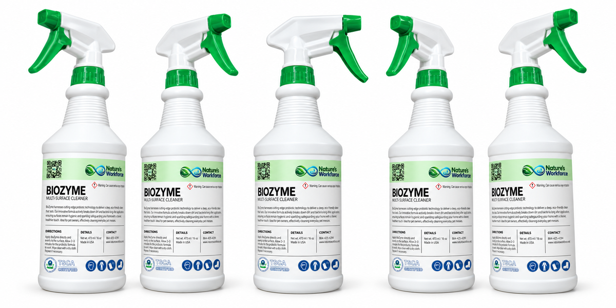 Five white spray bottles of BioZyme by Nature's Balance with green triggers and white caps, arranged in a row against a plain white background.